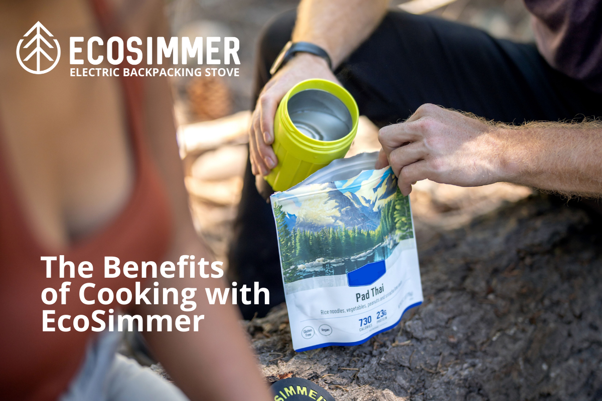 Man adding boiling water from EcoSimmer electric backpacking stove to freeze dried backpacking meal